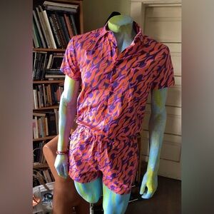 Vibrant Pink and Purple Patterned Romper from Zesties
